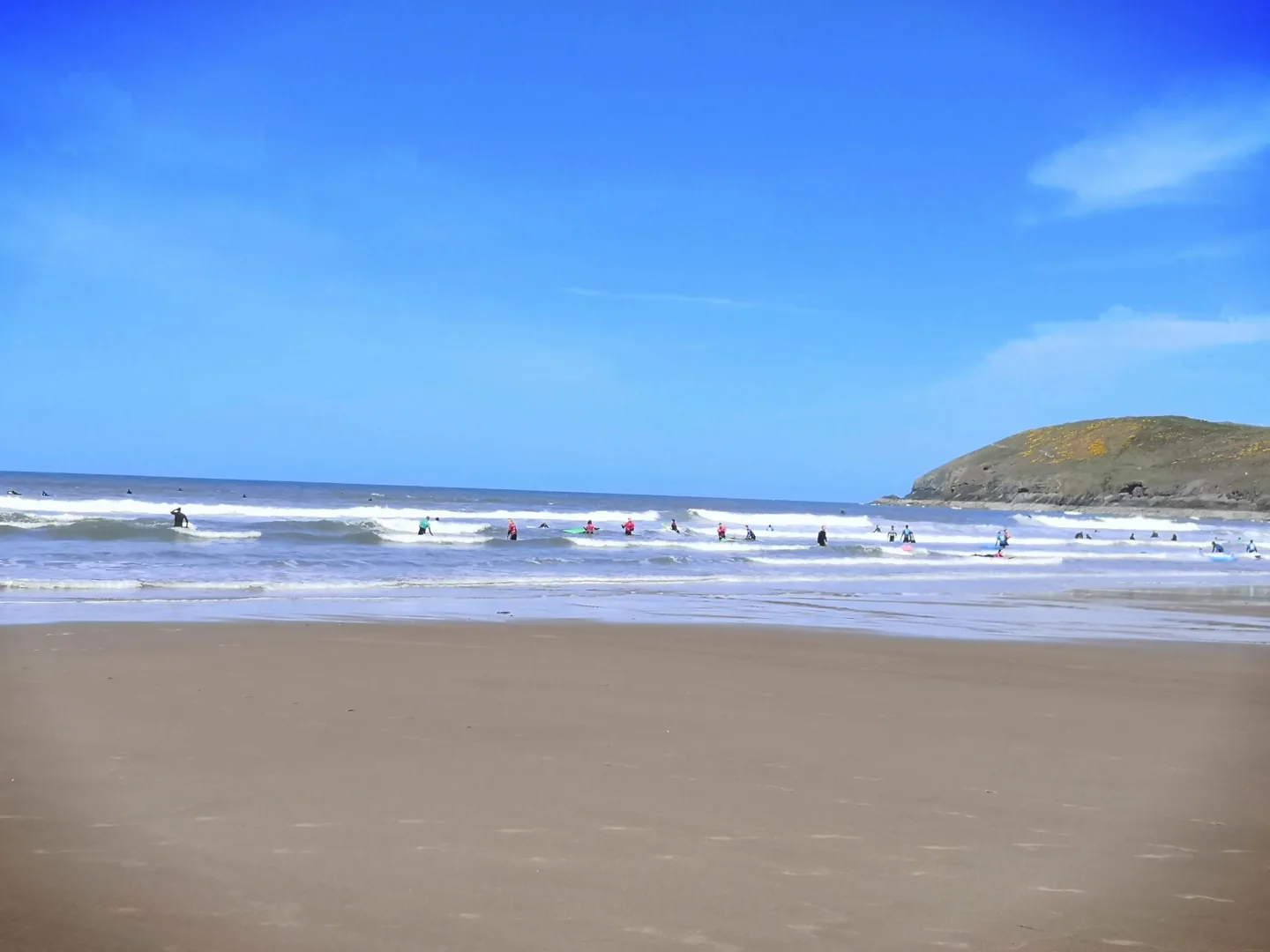 Sand and breaking waves on Croyde Beach