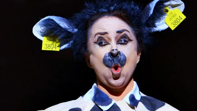 Promotional image for Carnage showing a performer with cow-like makeup and ear tags
